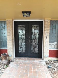 Iron Doors With Operable Glass Panels